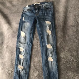 Distressed skinny jeans
